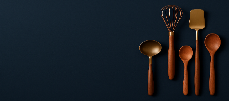 Navy blue background, display some retrostyle utensils on the extreme right